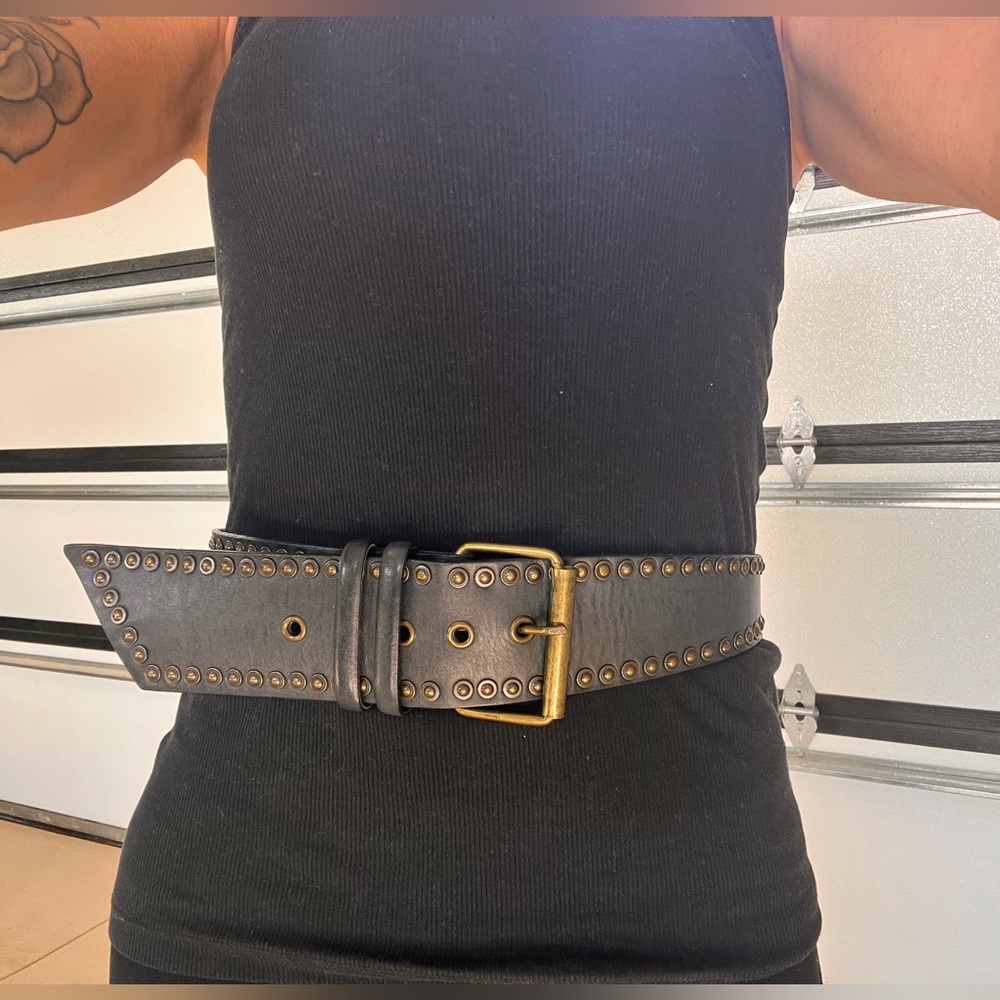 Black leather studded belt.